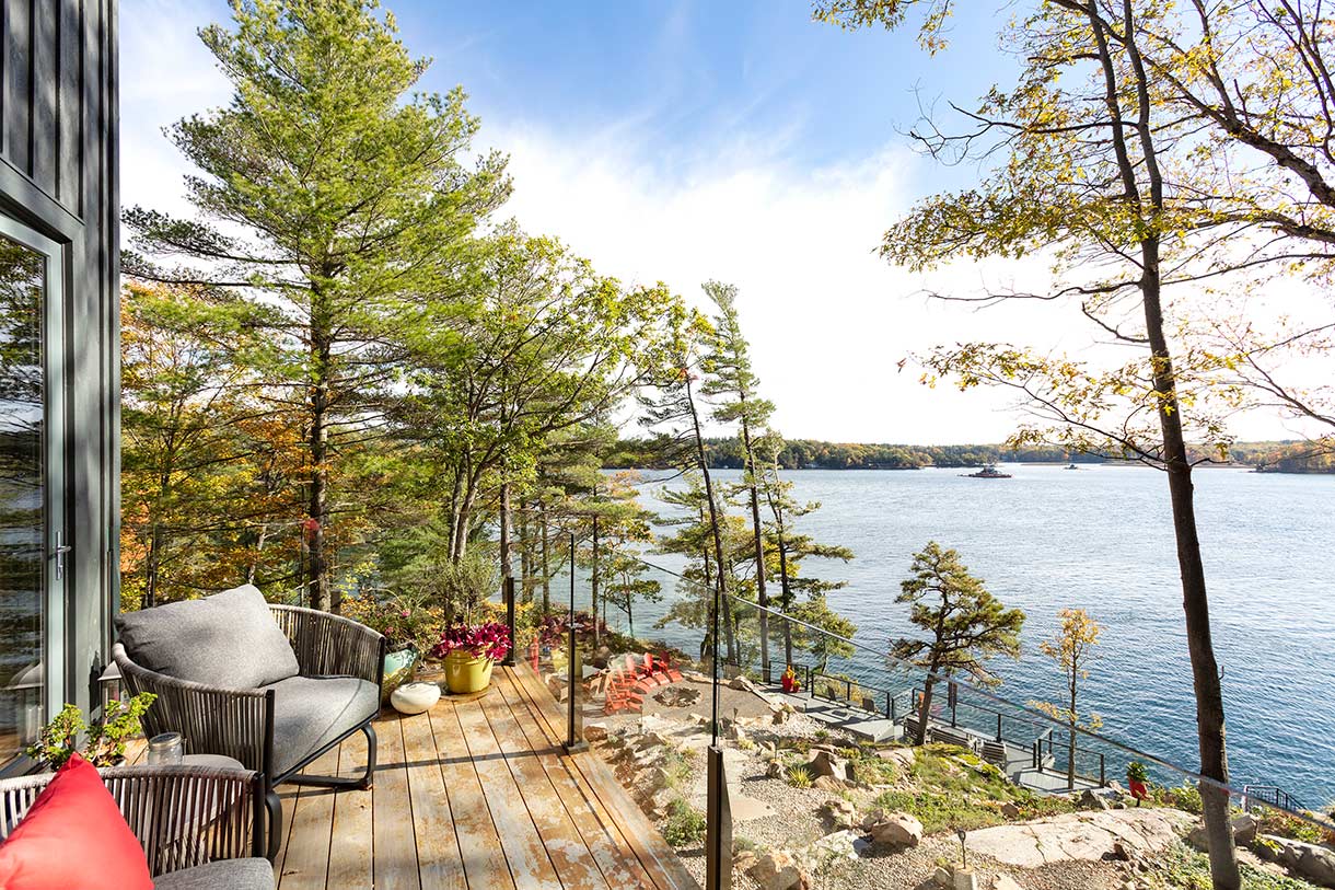 Deck and shoreline. Rock Haven House, Thousand Islands, Ontario, Canada.