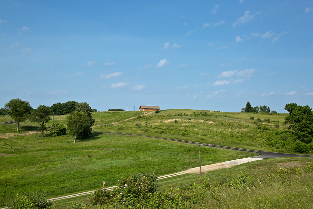 The shelter perched at the crest of a hill