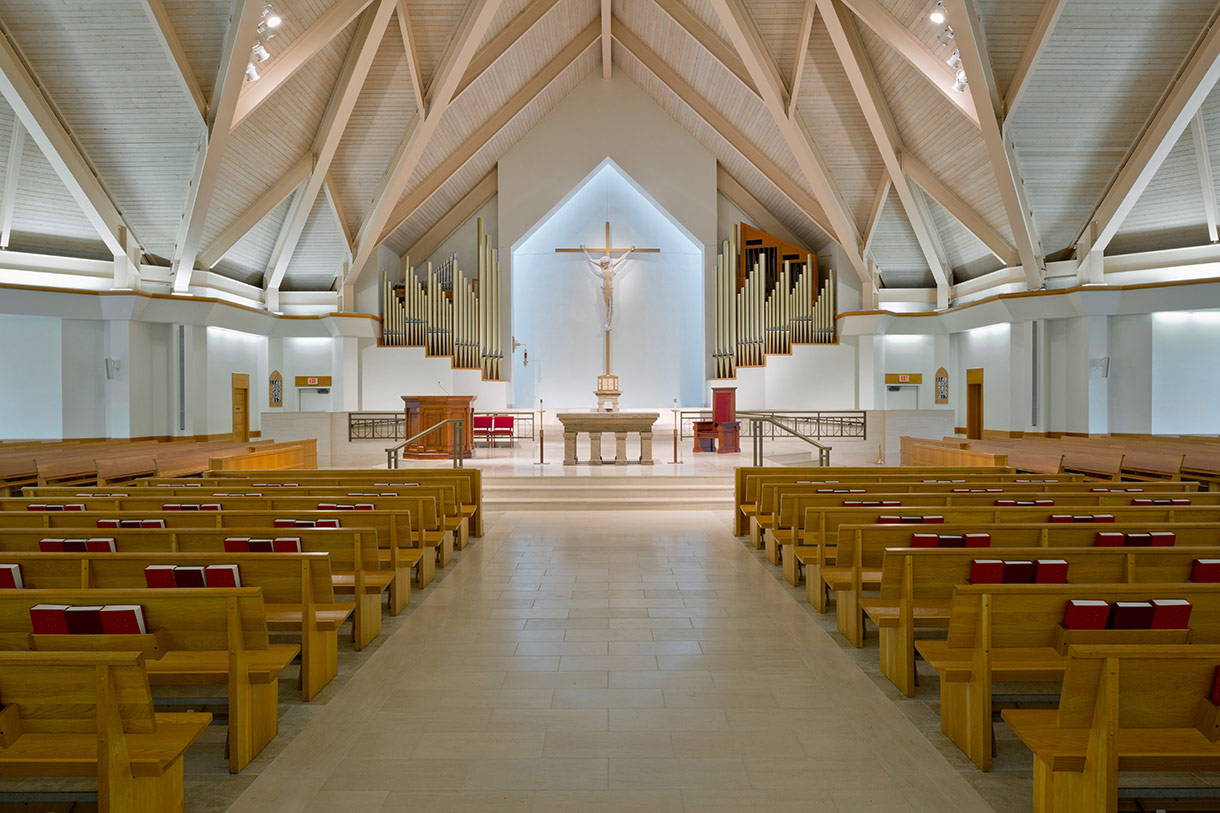 Aisle flanked by pews
