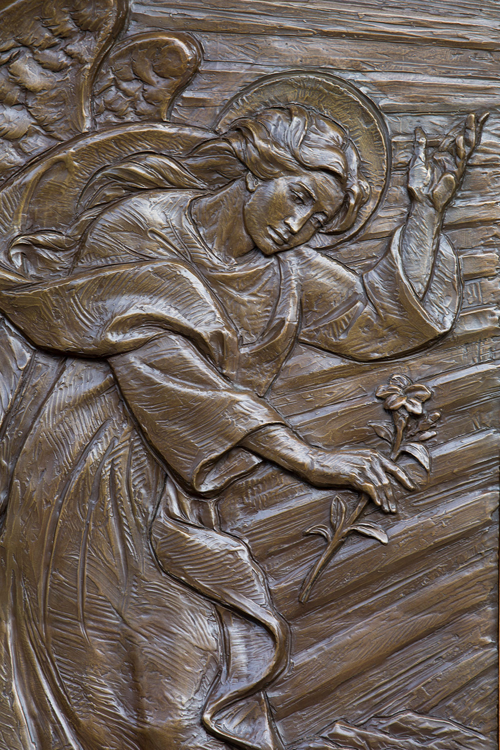 Bronze relief panel on entrance doors